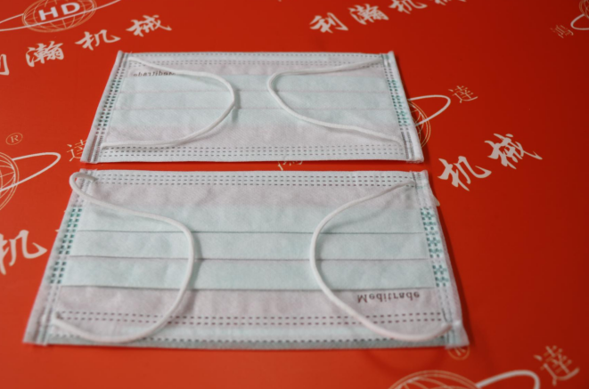 高速全電內耳包邊口罩機HD-11107 高速全電內耳包邊口罩機HD-11107